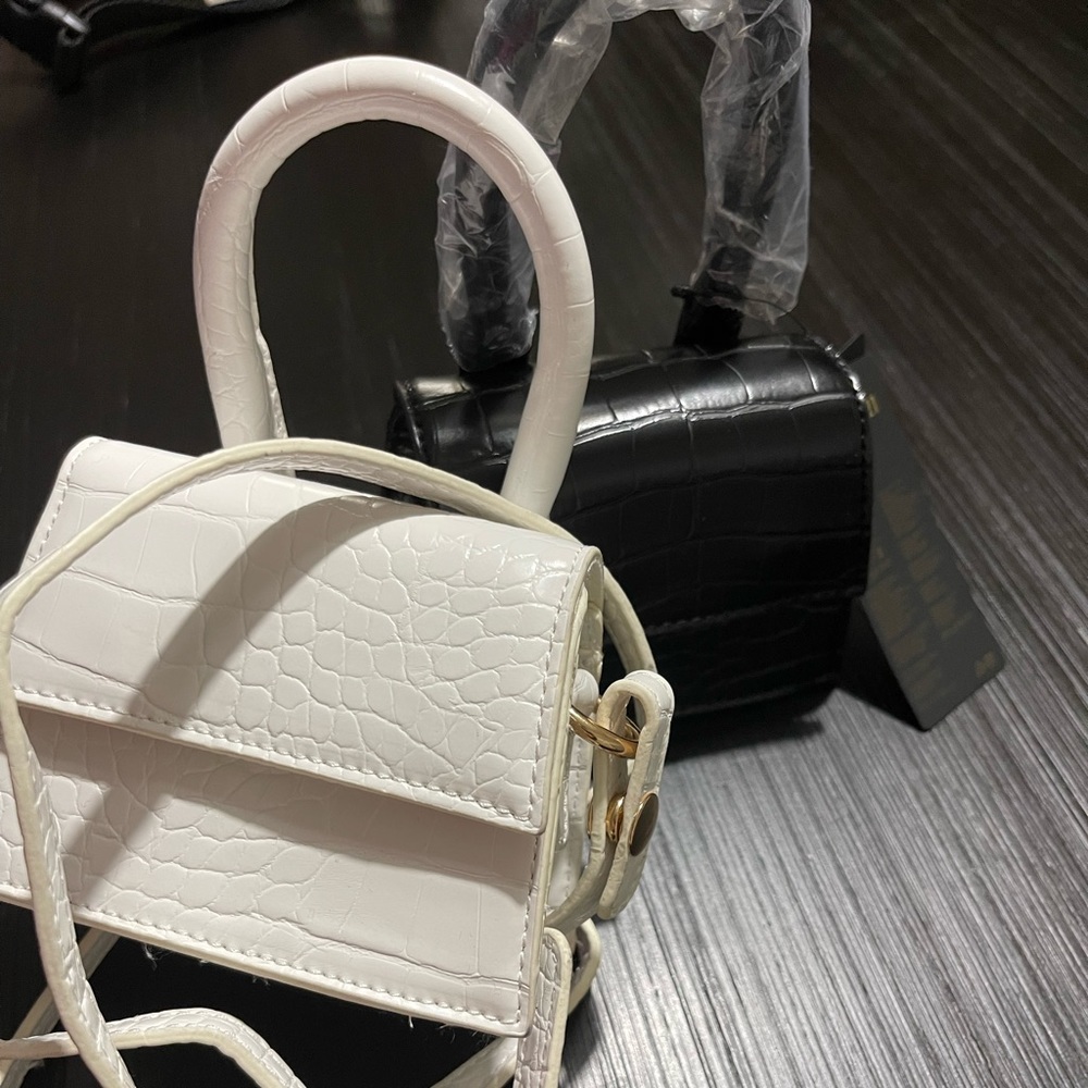 Mini purses with strap.